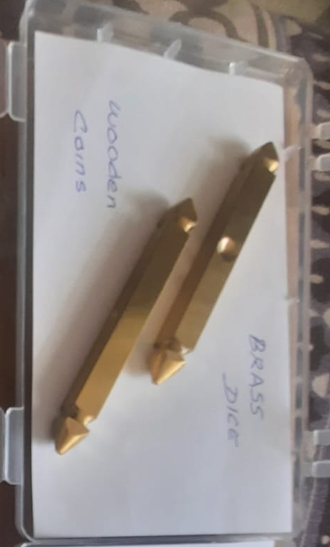 Brass dice